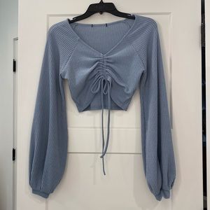 light blue ruched tie-up cropped blouse